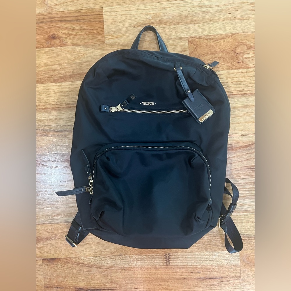 Tumi Classic Black Backpack with Gold Accents